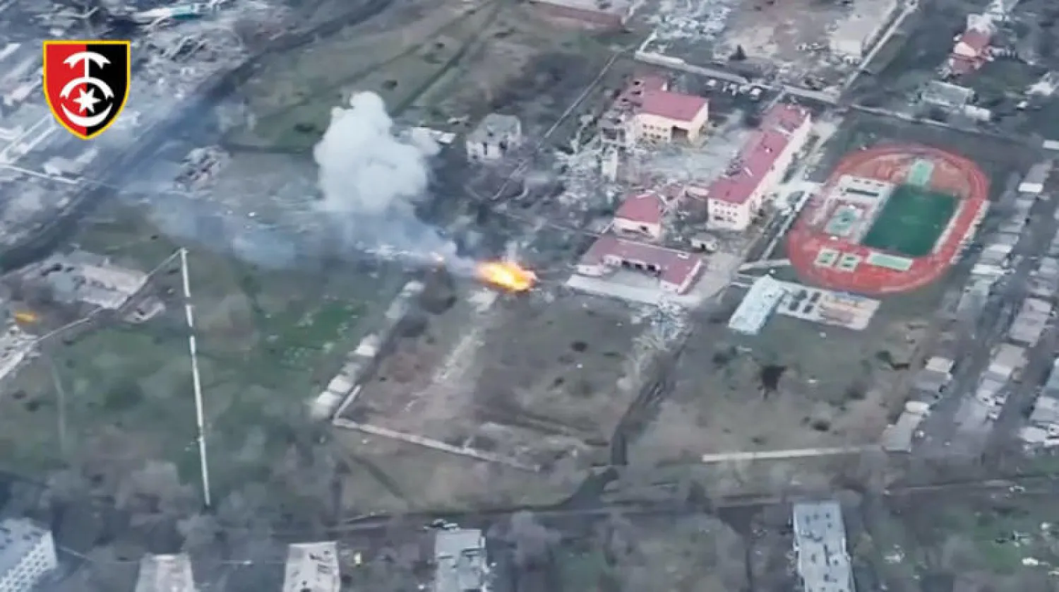 صورة جوية وزعتها كييف لحريق قالت إنه طال مخزناً عسكرياً روسياً في منطقة دونيتسك (رويترز)