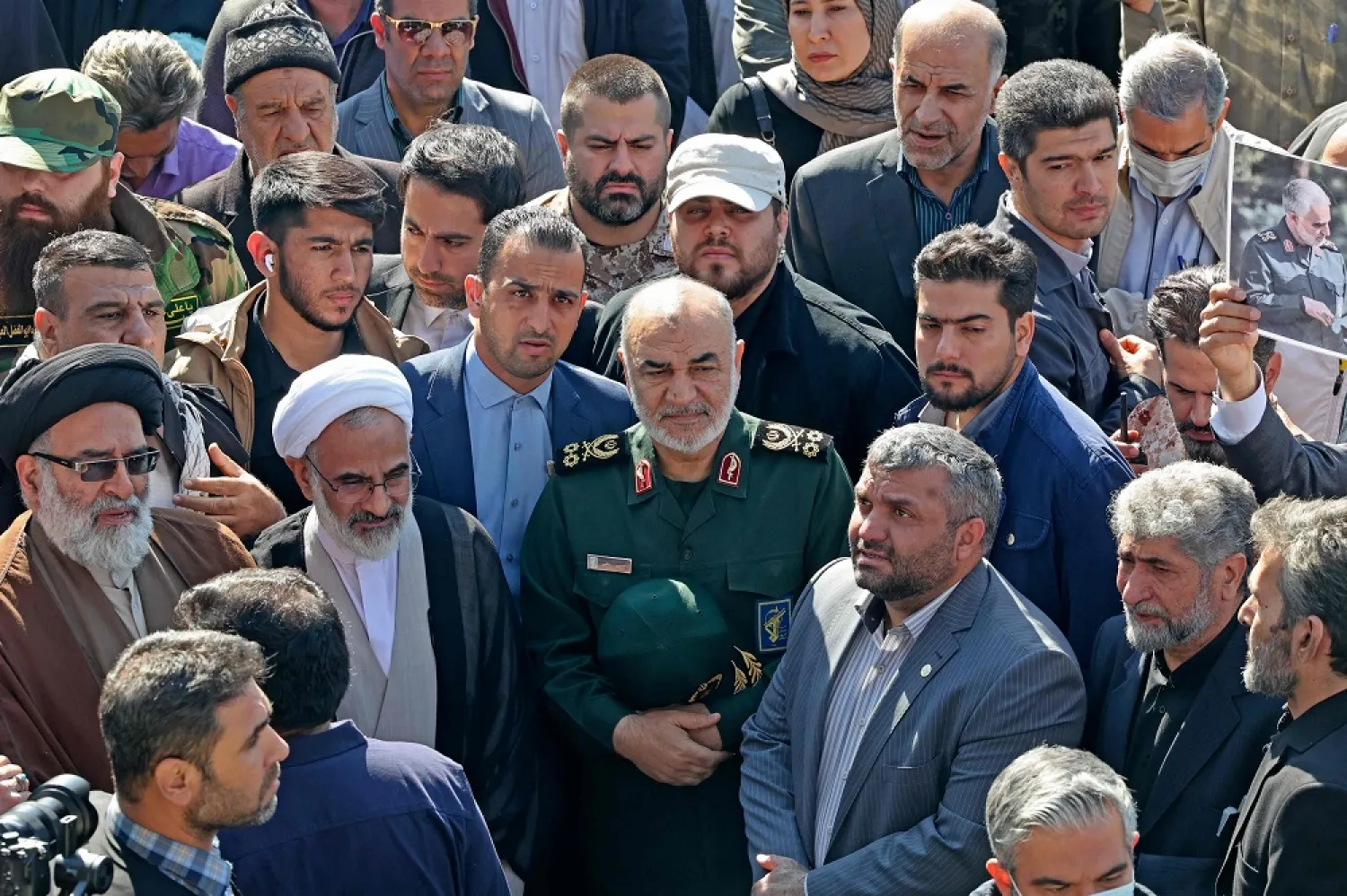 IRGC chief Hossein Salami (C) attends the funeral procession for two of Iran's revolutionary guard forces killed by Israel in Syria, held in Tehran on April 4, 2023. (AFP)