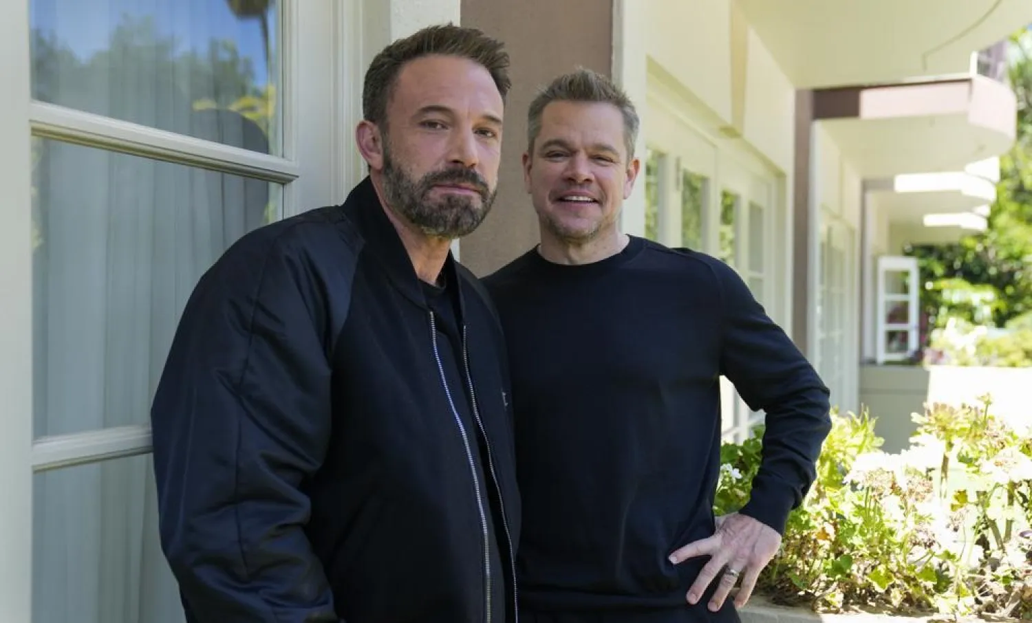 Ben Affleck, left, and Matt Damon pose for a portrait to promote the film "Air" on Monday, March 27, 2023, at the Four Seasons Hotel in Los Angeles. (AP)