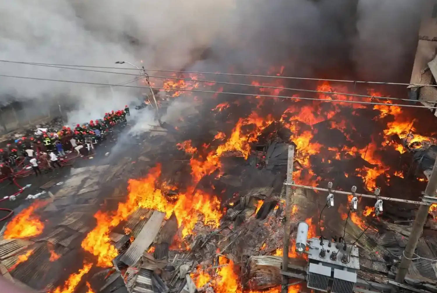 The blaze broke out in a clothing market in Dhaka early on Tuesday. Photograph: Abdul Goni/AFP/Getty Images
