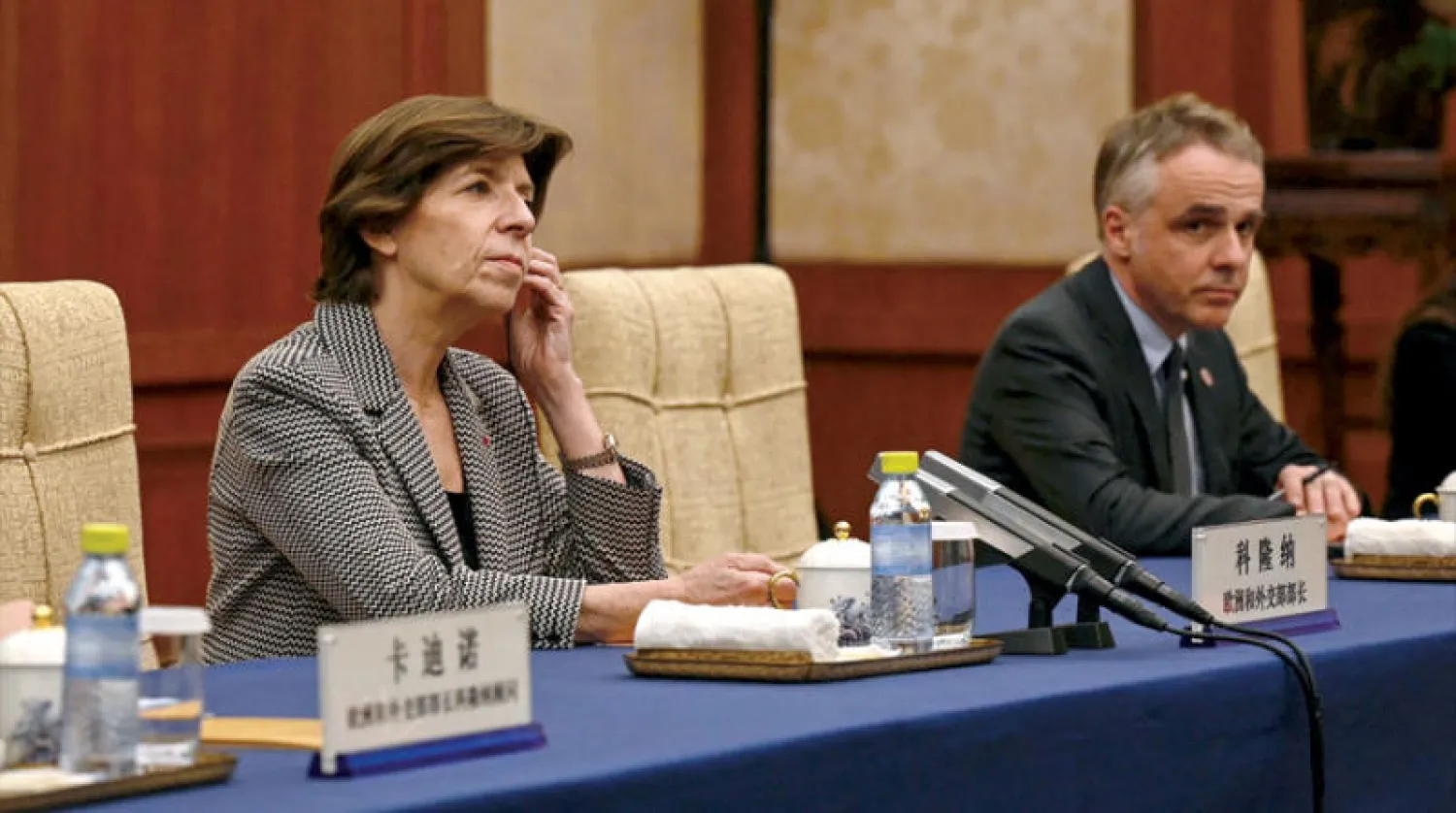 کولونا خلال لقاء مع نظيرها الصيني في بكين أول من أمس (رويترز)