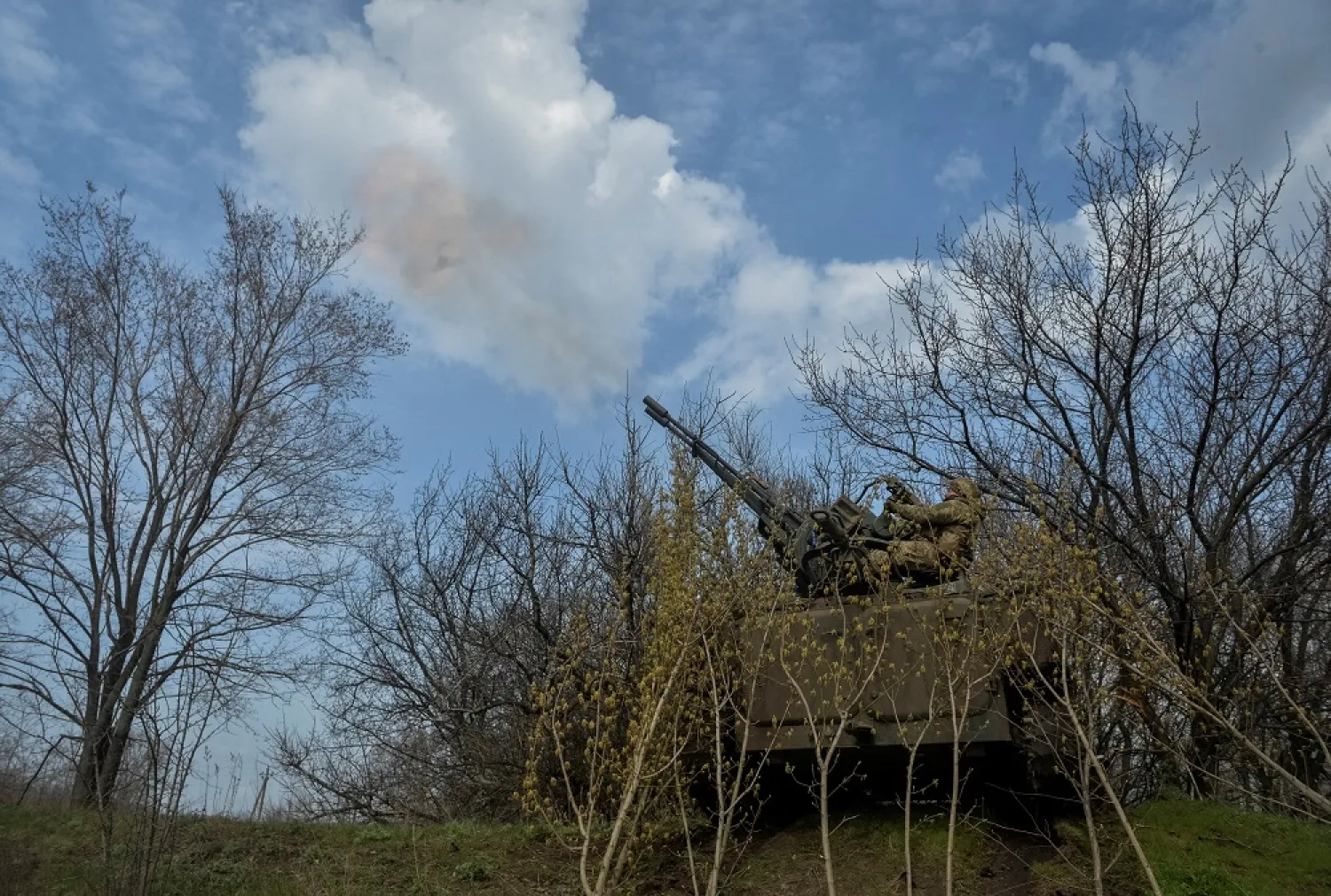 Ukrainian servicemen fire a military vehicle with anti-aircraft cannon, as Russia's attack on Ukraine continues, near the front line city of Bakhmut, Ukraine April 7, 2023. (Reuters)