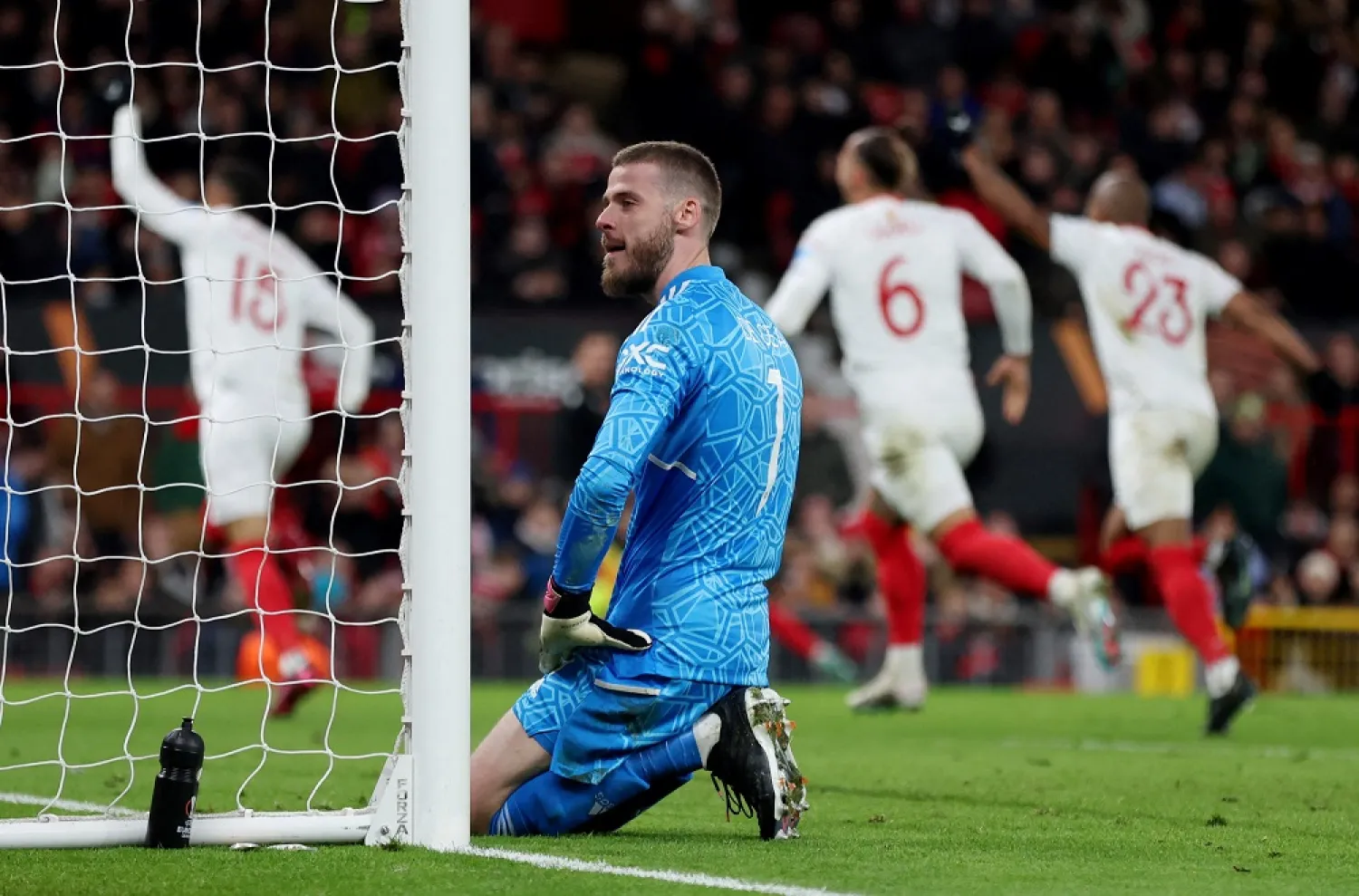 Football - Europa League - Quarter Final - First Leg - Manchester United v Sevilla - Old Trafford, Manchester, Britain - April 13, 2023 Manchester United's David de Gea reacts after Harry Maguire scores an own goal and Sevilla's second. (Reuters)