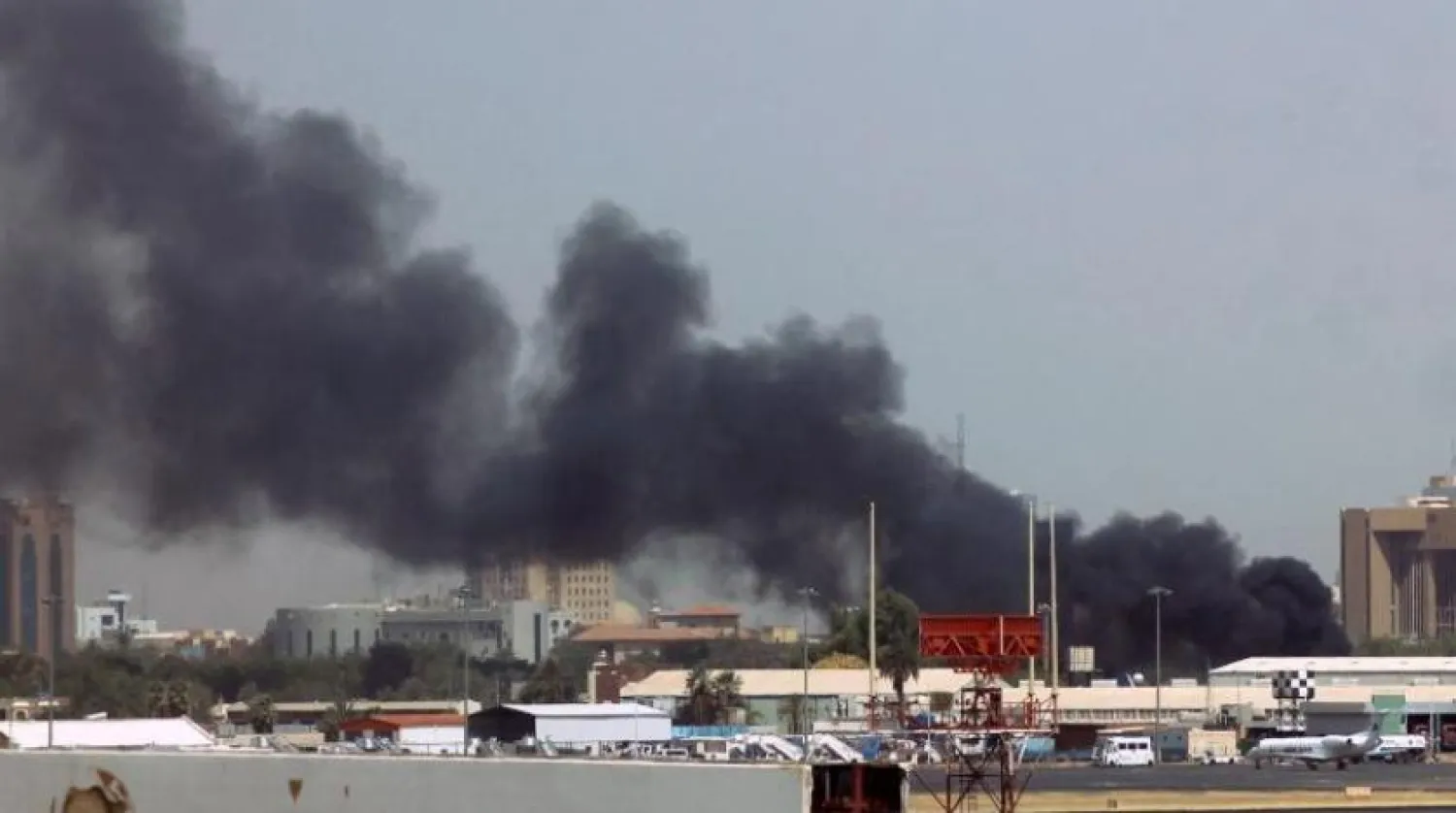 Heavy smoke bellows above buildings in the vicinity of the Khartoum airport on April 15, 2023, amid clashes in the Sudanese capital. (Photo by AFP)