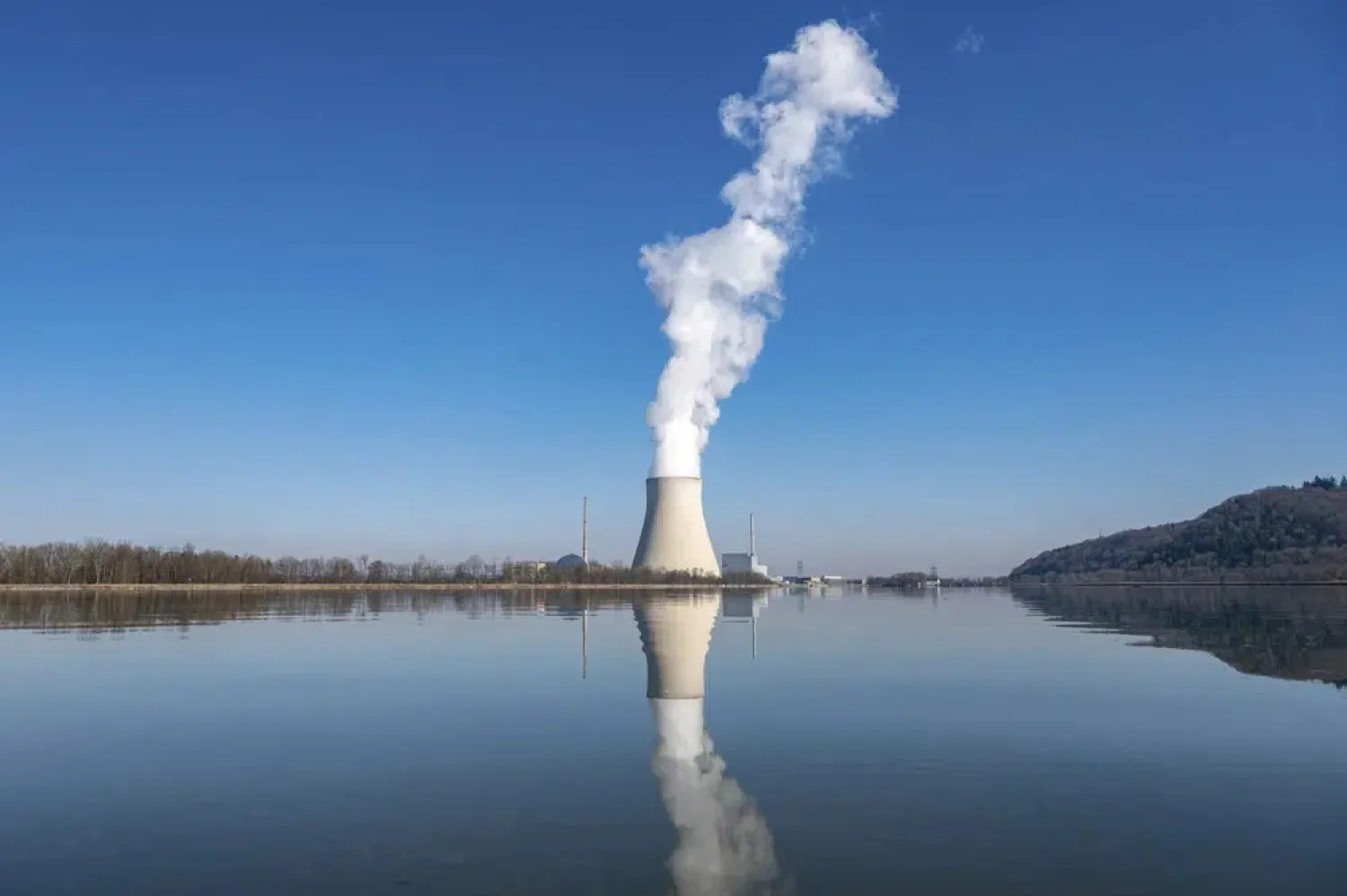 Water vapor rises from the nuclear power plant Isar II in Essenbach, Germany, March 3, 2022. (AP)