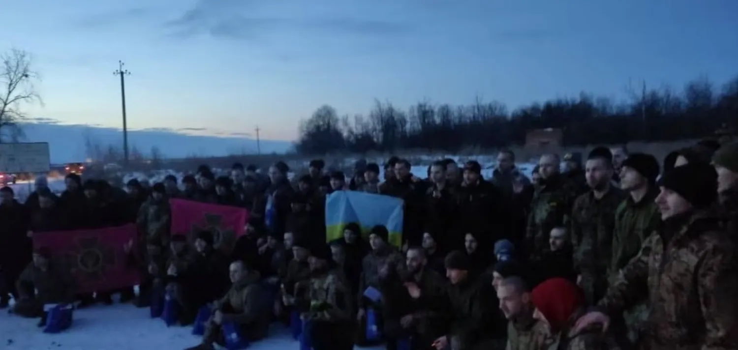 Ukrainian prisoners of war (POWs) pose for a picture after a swap, amid Russia's attack on Ukraine, in an unknown location, Ukraine, in this handout picture released February 16, 2023. Head of Ukraine's Presidential Office Andriy Yermak via Telegram/Handout via REUTERS