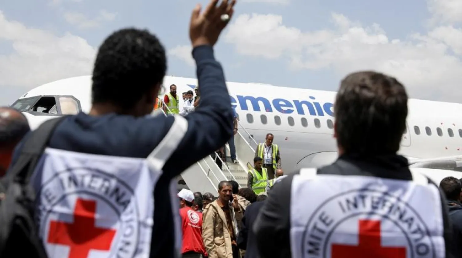 A person waves as an International Committee of the Red Cross (ICRC)-chartered plane carrying freed prisoners arrives at Sanaa Airport, amid a prisoner swap, in Sanaa, Yemen April 14, 2023. (Reuters)