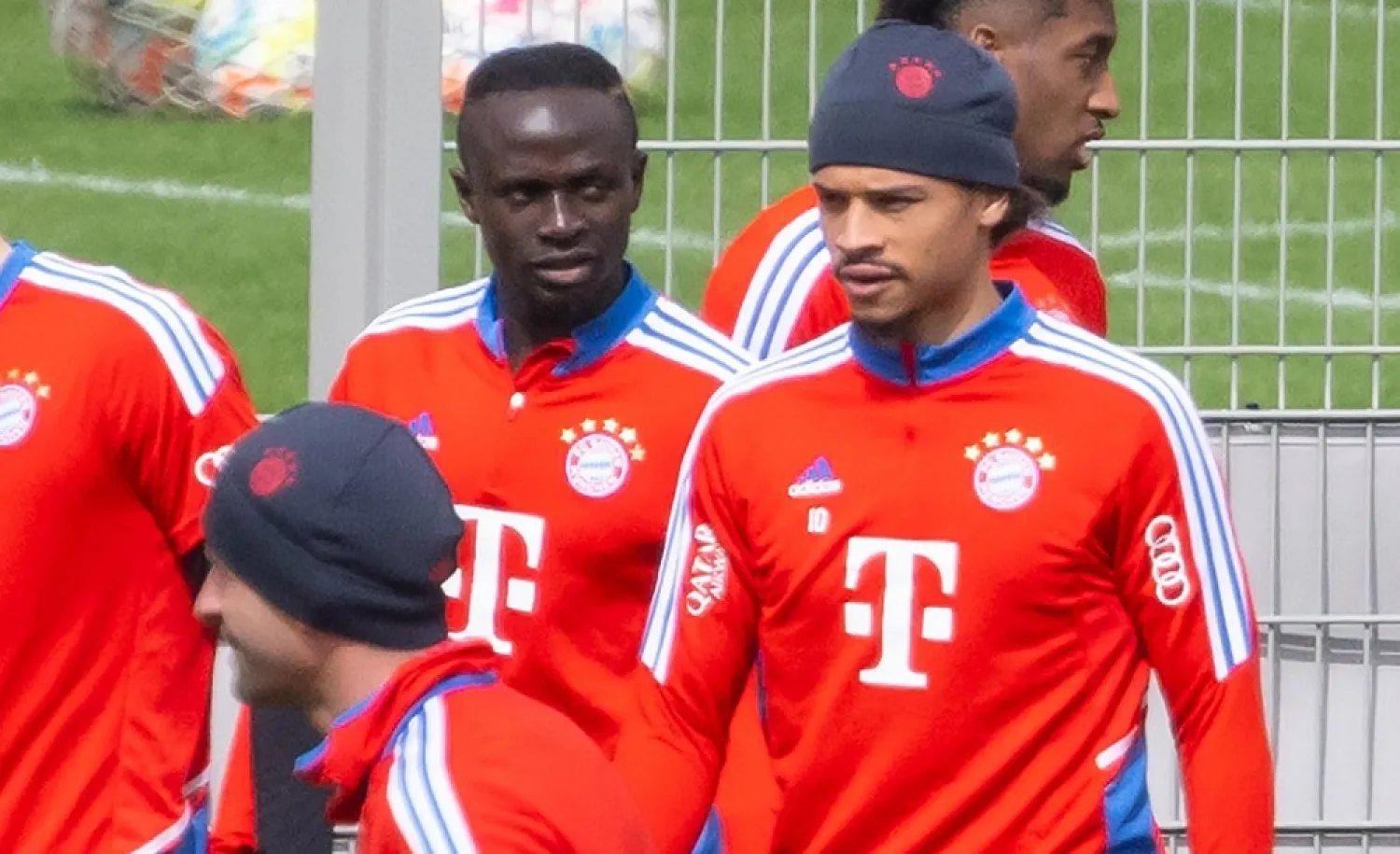 13 April 2023, Bavaria, Munich: Bayern Munich's Sadio Mane (L) and Leroy Sane arrive for a training session at the club's Saebener street site. (dpa)