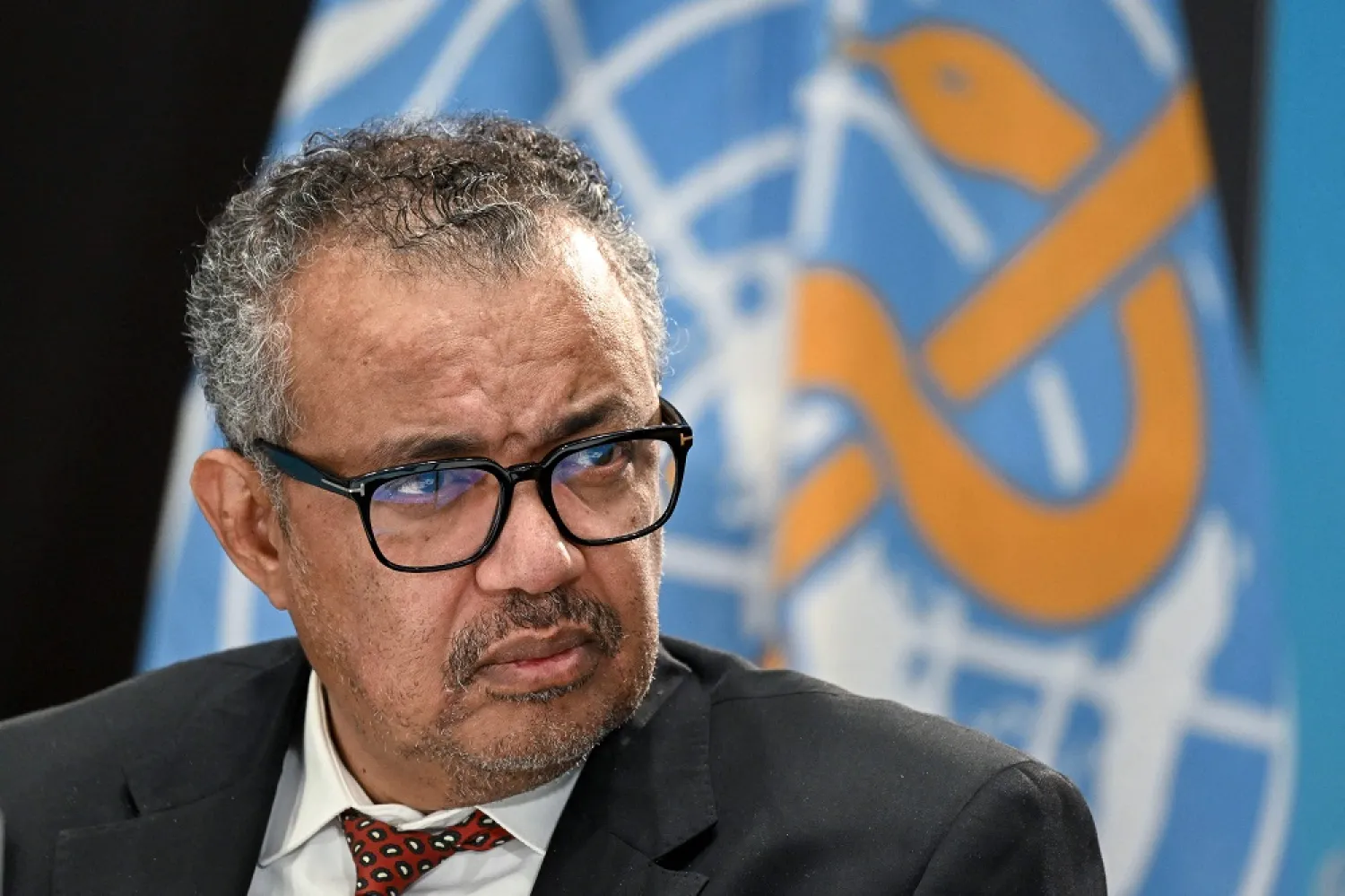 World Health Organization (WHO) chief Tedros Adhanom Ghebreyesus looks on during a press conference on the World Health Organization's 75th anniversary in Geneva, on April 6, 2023. (AFP) 