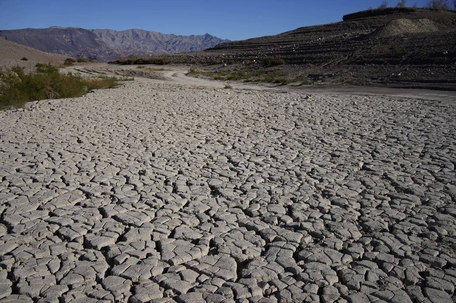Cracked earth is visible in an area once under the water of Lake Mead at the Lake Mead National Recreation Area, Jan. 27, 2023, near Boulder City, Nev. (AP)