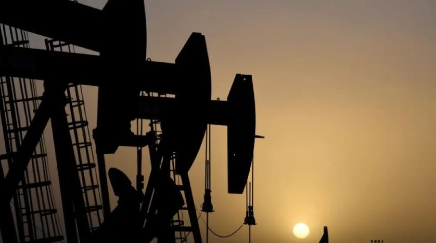 Pump jacks operate at sunset in Midland, Texas, US, February 11, 2019. REUTERS/Nick Oxford
