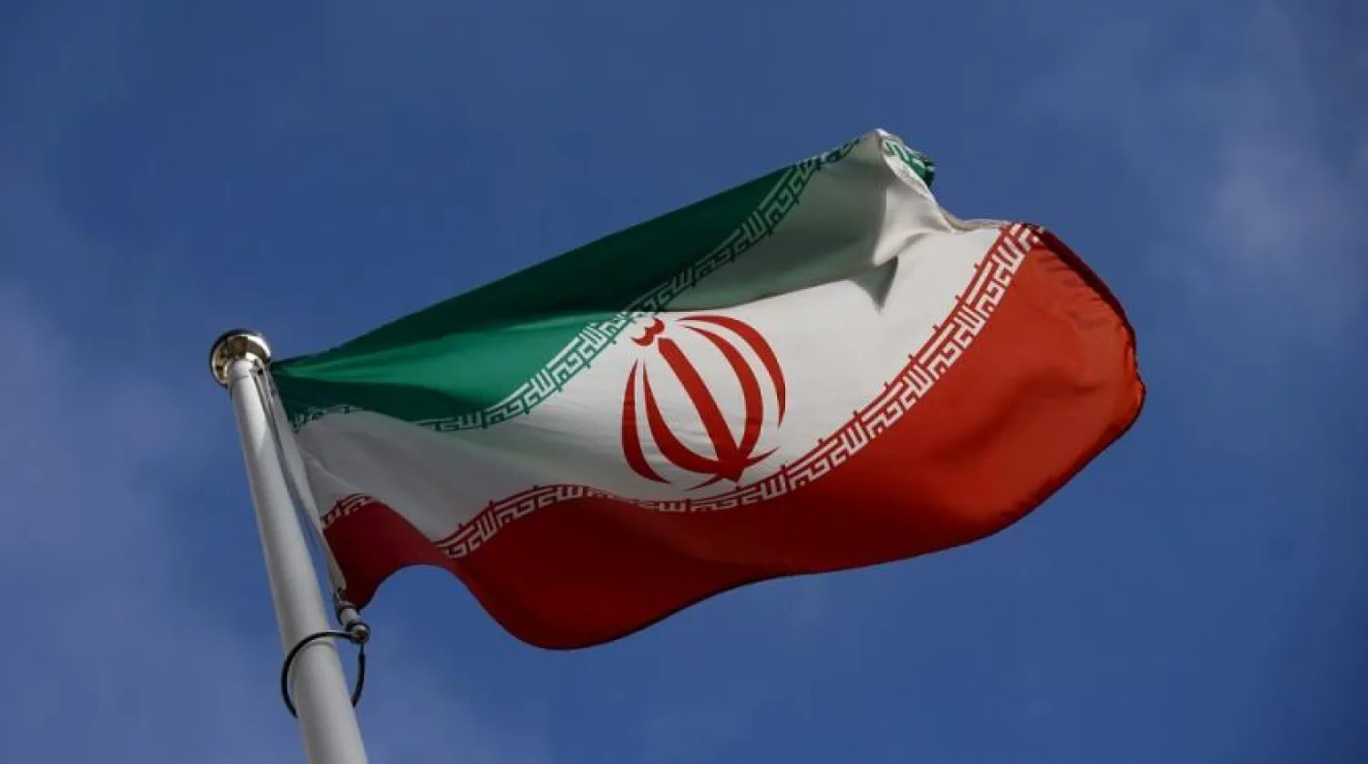 The Iranian flag waves in front of the International Atomic Energy Agency (IAEA) headquarters, before the beginning of a board of governors meeting, in Vienna, Austria, March 1, 2021. (Reuters)