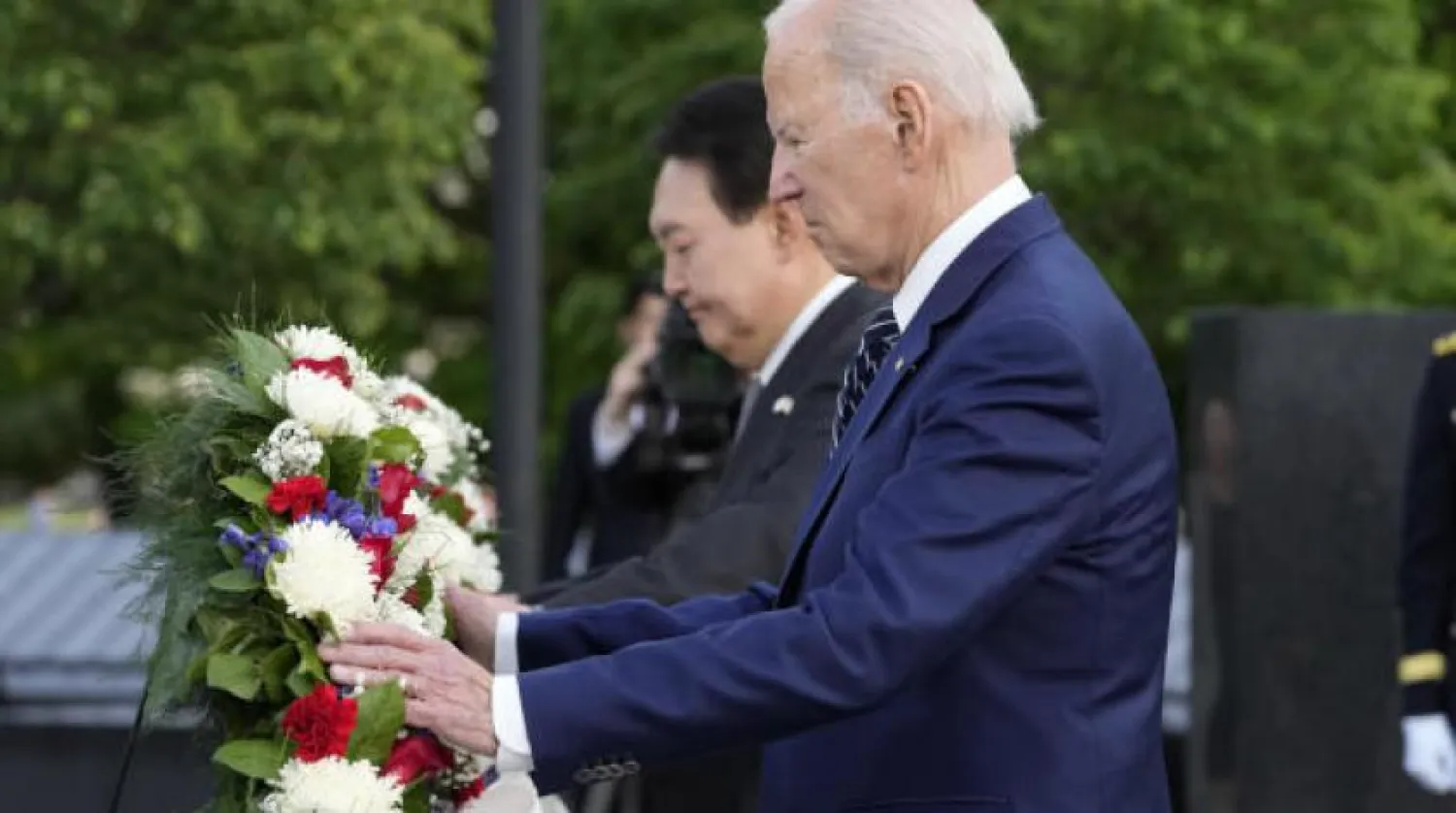 US President Joe Biden and South Korea’s President Yoon Suk Yeol lay a wreath as they visit the Korean War Veterans Memorial in Washington, Tuesday, April 25, 2023. (AP Photo/Susan Walsh)