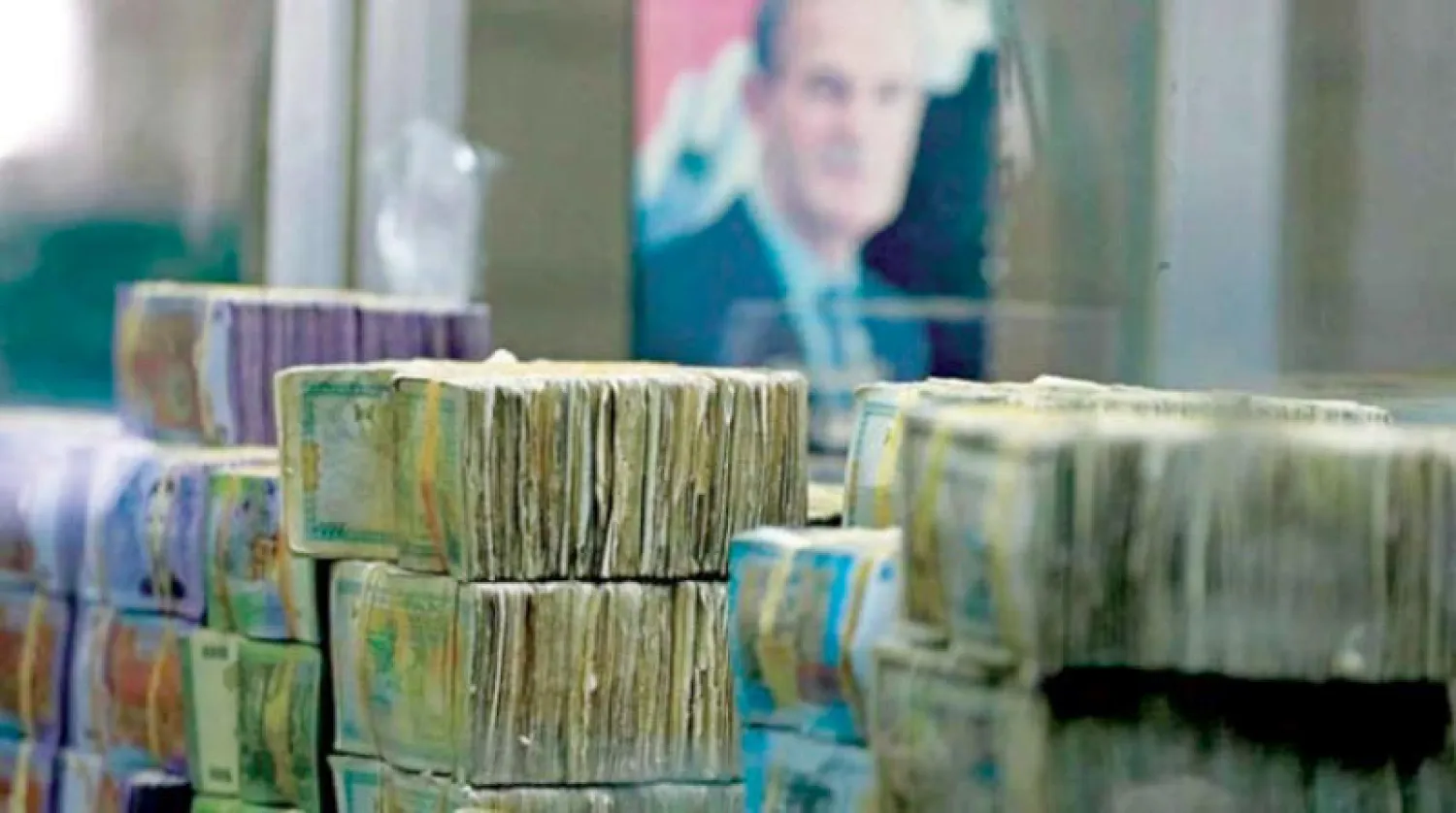 عملات سورية ورقية (أ.ف.ب)