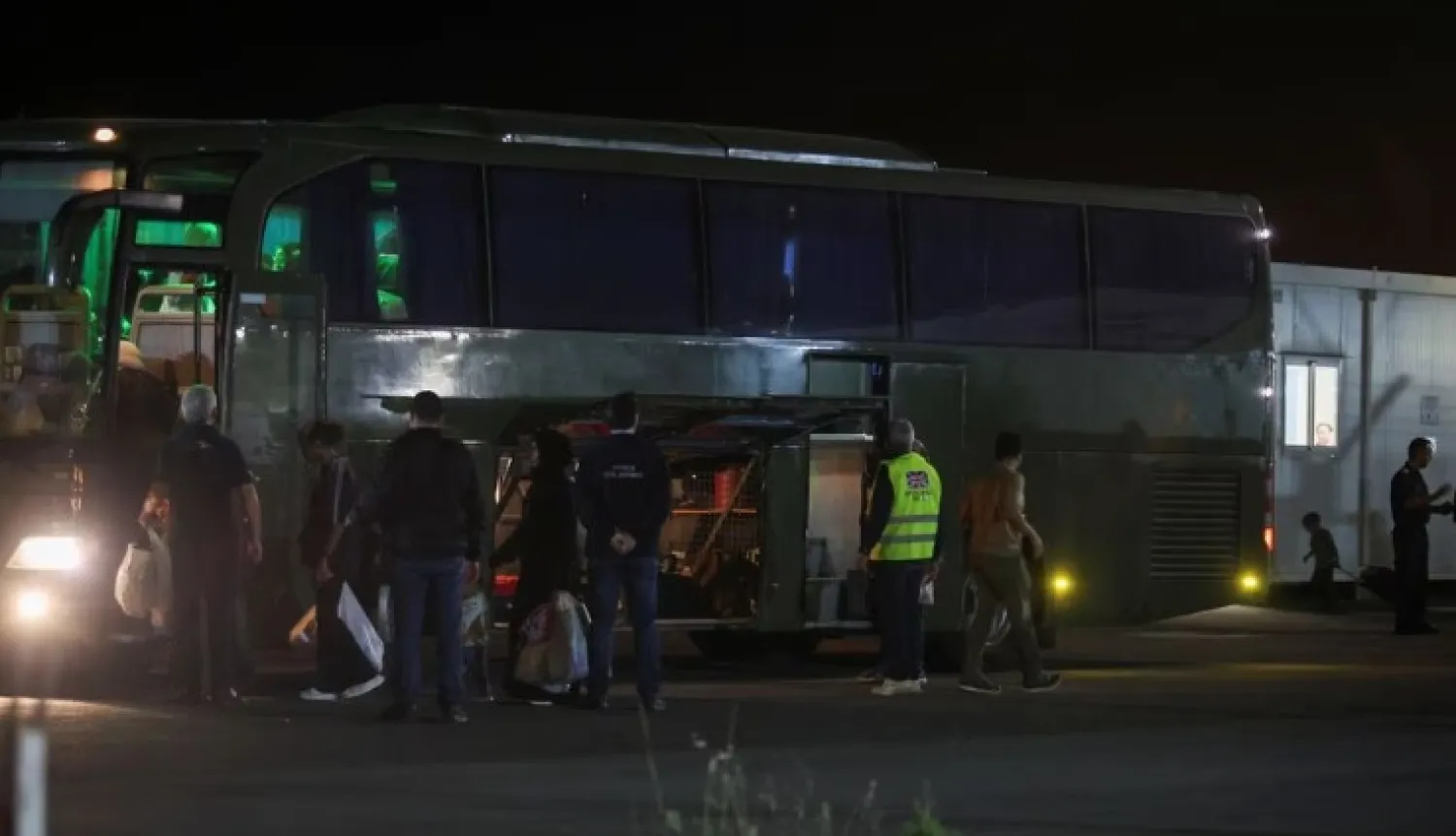 British nationals, who have been evacuated from Sudan, arrive at the Larnaca International Airport, in Larnaca, Cyprus, April 25, 2023. REUTERS/Yiannis Kourtoglou