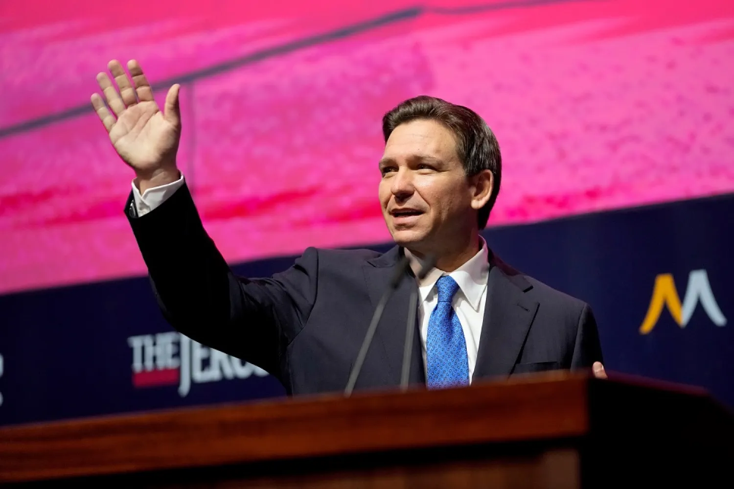 Florida Gov. Ron DeSantis waves as he arrives to a conference titled "Celebrate the Faces of Israel" at Jerusalem's Museum of Tolerance, 27 April 2023. (EPA)
