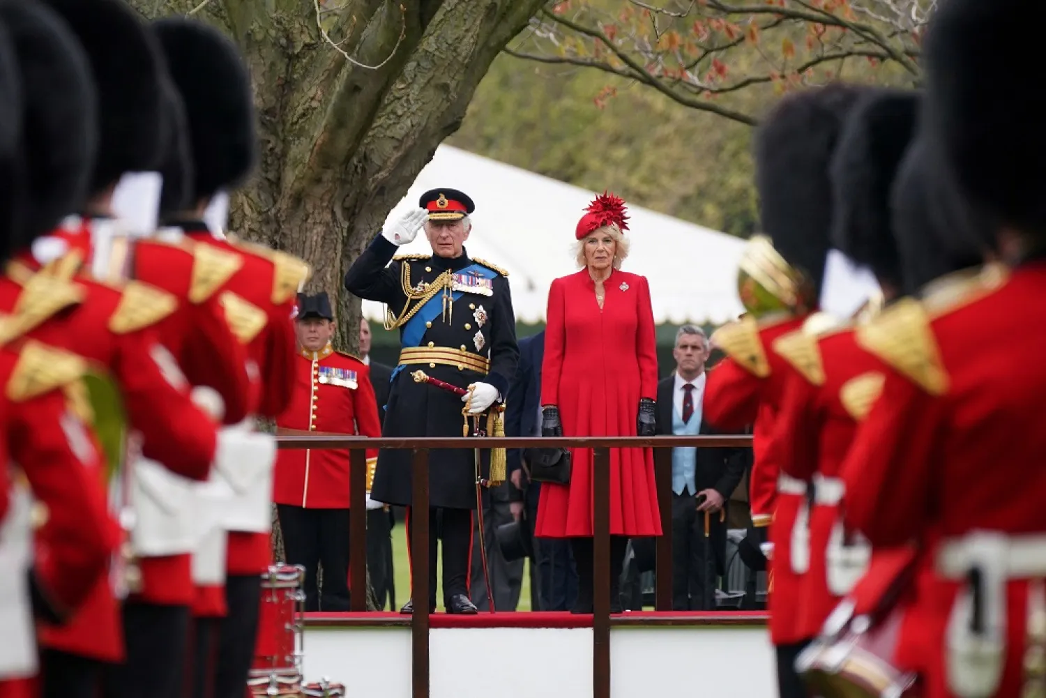 King Charles III and Camilla, the Queen Consort attends a ceremony where they presented new Standards and Colors to the Royal Navy; the Life Guards of the Household Cavalry Mounted Regiment; The King's Company of the Grenadier Guards, and The King's Color Squadron of the Royal Air Force, at Buckingham Palace in London. Picture date: Thursday April 27, 2023. (Reuters)