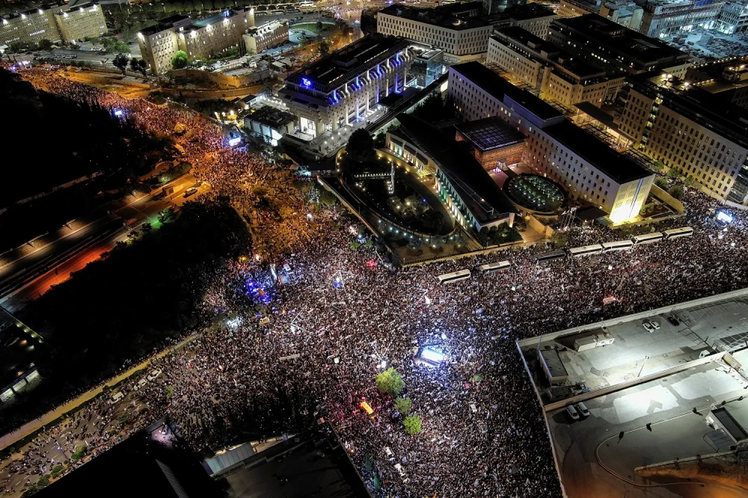 An aerial view shows right-wing demonstrators at a protest calling on the Israeli government to complete its planned judicial overhaul, in front of the Knesset, Israel's Parliament, in Jerusalem, April 27, 2023. (Reuters)