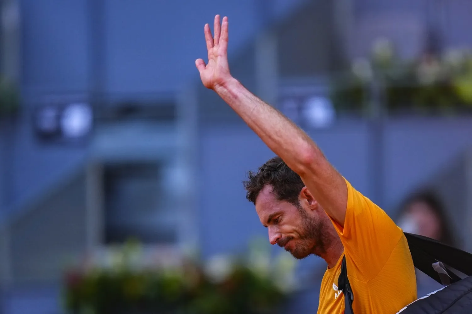 Andy Murray, of Britain, waves to the crowd as he leaves the court after losing against Andrea Vavassori of Italy during their match at the Madrid Open tennis tournament in Madrid, Spain, Thursday, April 27, 2023. (AP)
