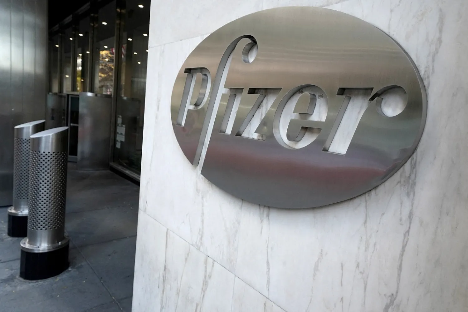 The Pfizer logo is pictured on their headquarters building in the Manhattan borough of New York City, New York, US, November 9, 2020. (Reuters)