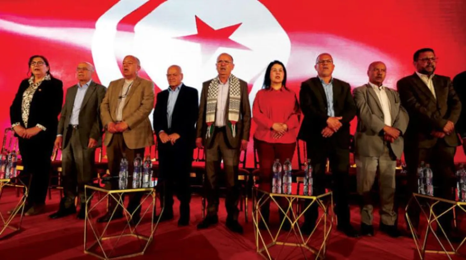 Sendika Başkanı Tabbubi (ortada) pazartesi kutlamalarına katıldı.  (EPA)