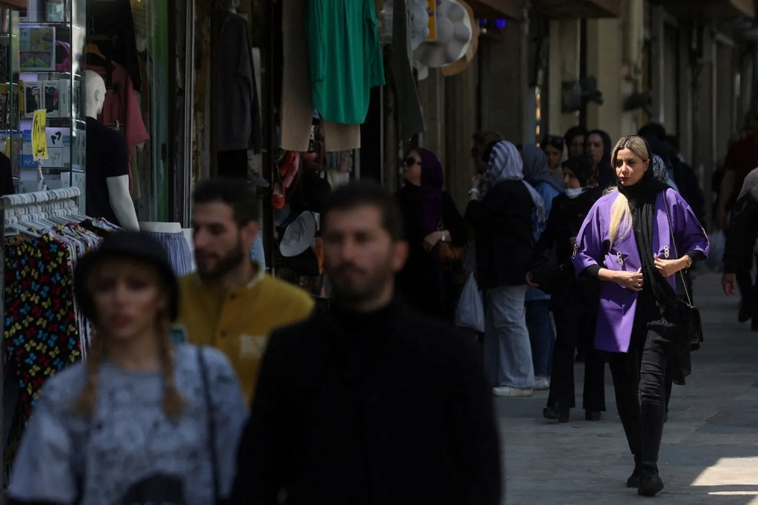An Iranian woman walks on a street amid the implementation of the new hijab surveillance in Tehran, Iran, April 15, 2023. (WANA (West Asia News Agency) via Reuters