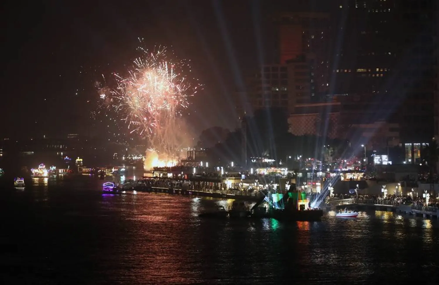Fireworks explode over the Nile River during New Year's Eve celebrations in Cairo, Egypt, 01 January 2024. (EPA)