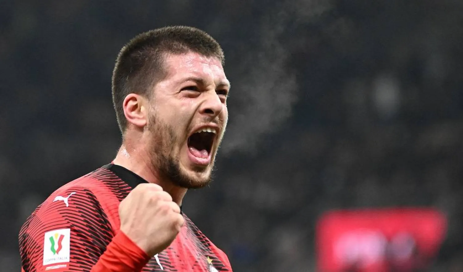 AC Milan’s forward Luka Jović celebrates after scoring during the Coppa Italia match between AC Milan and Cagliari Calcio, in Milan, Italy, 02 January 2024. (EPA)