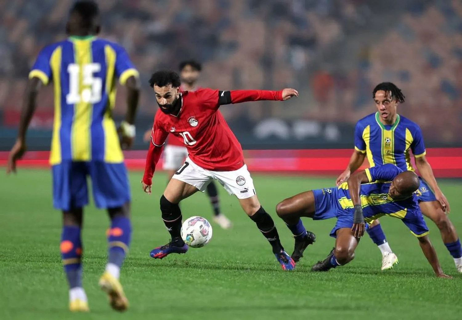 Football - International Friendly - Egypt v Tanzania - Cairo Stadium, Cairo, Egypt - January 7, 2024 Egypt's Mohamed Salah in action with Tanzania's Himid Mao. (Reuters)