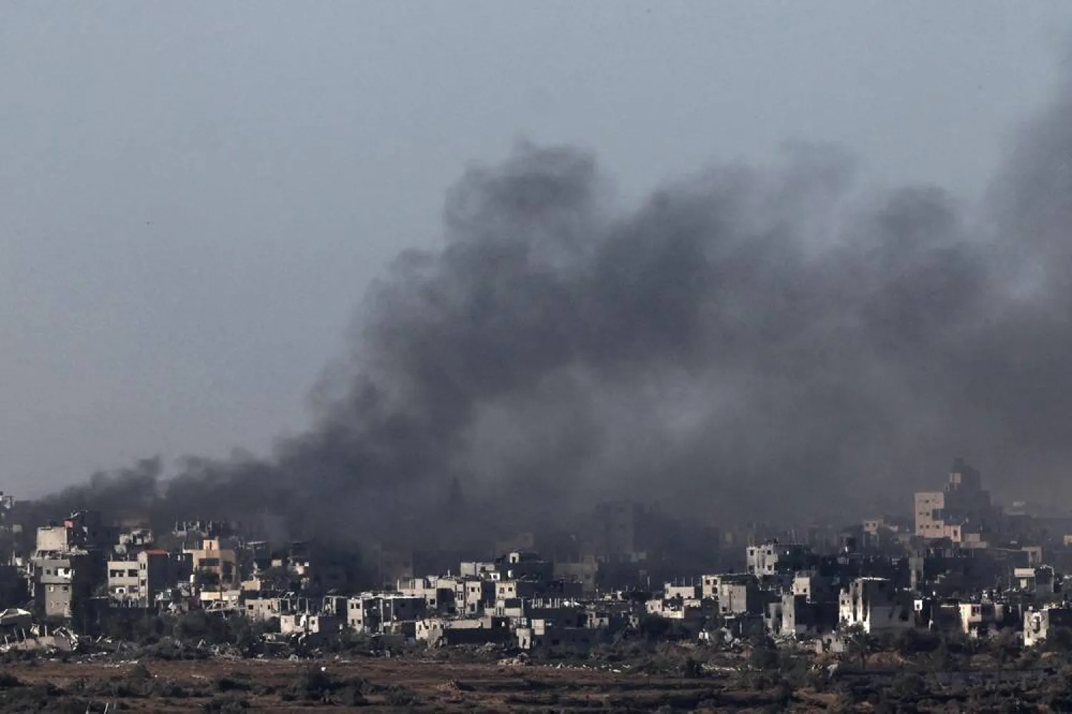  A picture taken from a position in southern Israel along the border with the Gaza Strip on January 10, 2024, shows smoke billowing over the Palestinian territory amid continuing battles between Israel and the militant group Hamas. (AFP)
