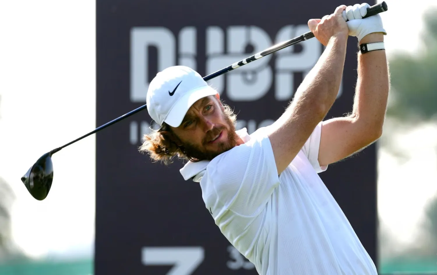 Tommy Fleetwood of England tees off on the third hole during the third round of Dubai Invitational golf tournament, in Dubai, United Arab Emirates, Saturday, Jan. 13, 2024. (AP Photo/Kamran Jebreili)
