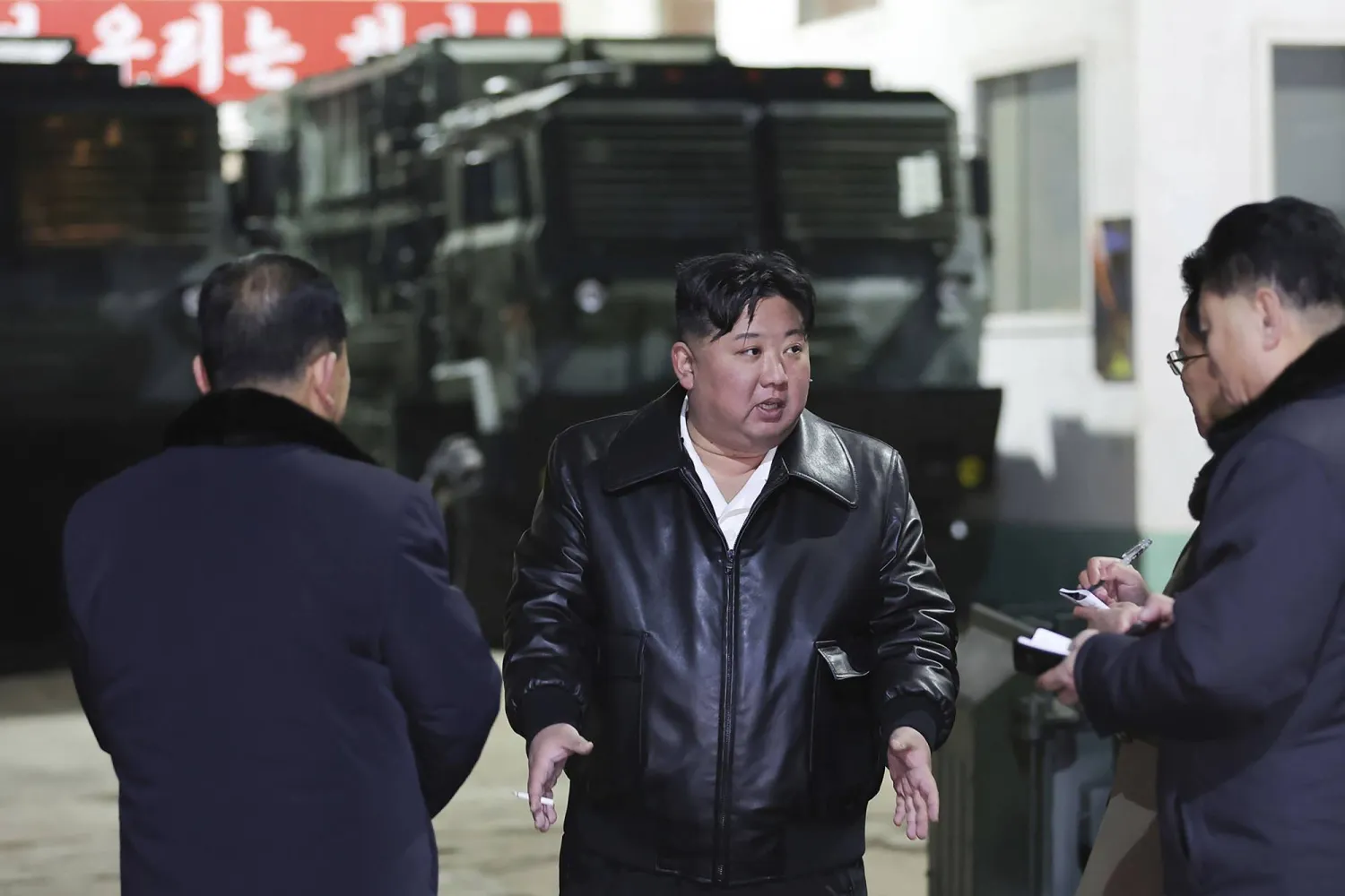 In this photo provided by the North Korean government, North Korean leader Kim Jong Un, center, inspects as he tours munitions factories in North Korea on Jan. 8-9, 2024. (Korean Central News Agency/Korea News Service via AP)
