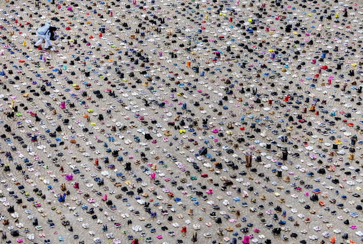 Children’s shoes in Amsterdam’s square on Saturday during a symbolic movement in solidarity with Palestinian children killed in the current war in the Gaza Strip (AP)