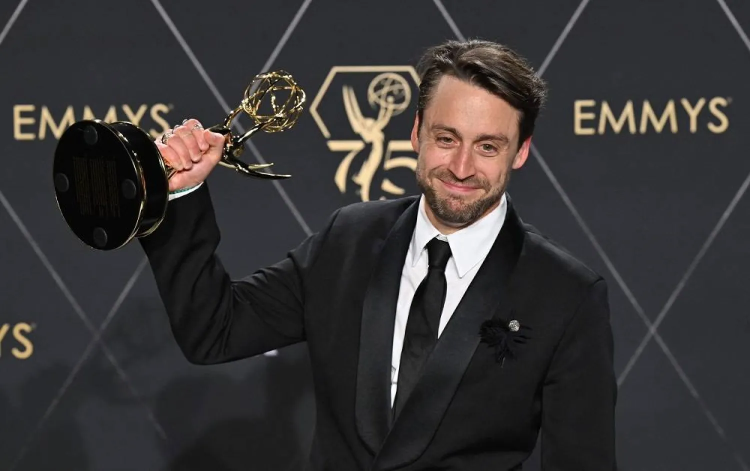 US actor Kieran Culkin poses in the press room with the award for Outstanding Lead Actor In A Drama Series for "Succession" during the 75th Emmy Awards at the Peacock Theater at L.A. Live in Los Angeles on January 15, 2024. (AFP)