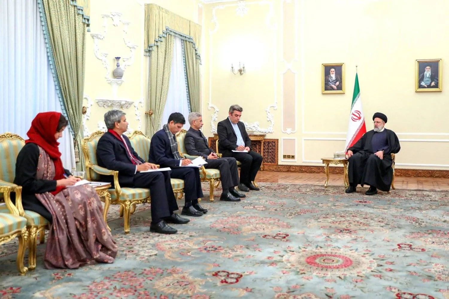 Iranian President Ebrahim Raisi receives Indian Foreign Minister Subrahmanyam Jaishankar in Tehran (AFP)
