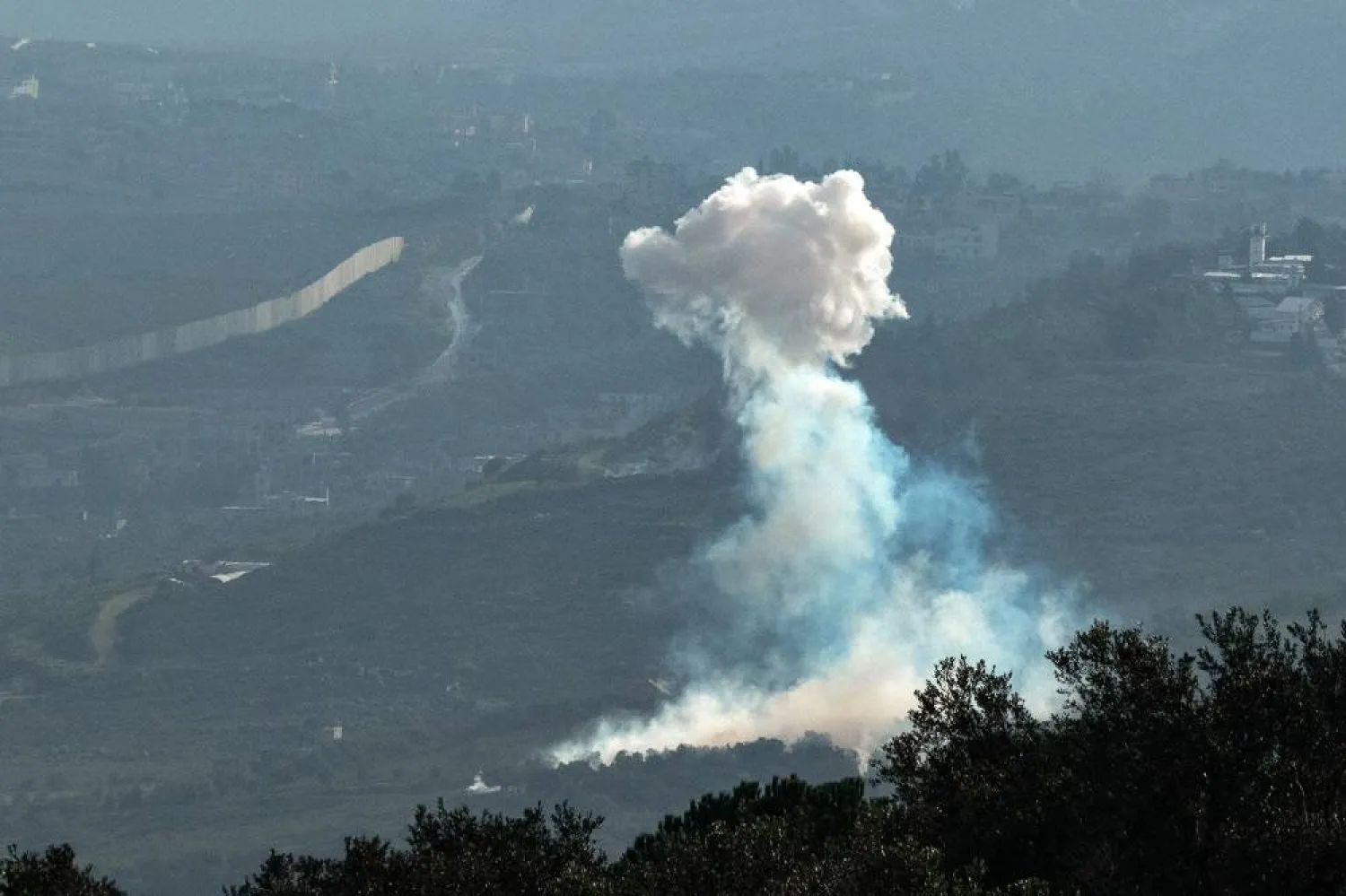 Smoke billows over the southern Lebanese village of al-Khiam near the border with Israel on January 18, 2024, amid cross-border tensions with Lebanon, as fighting continues between Israel and the Palestinian militant group Hamas in Gaza. (AFP)