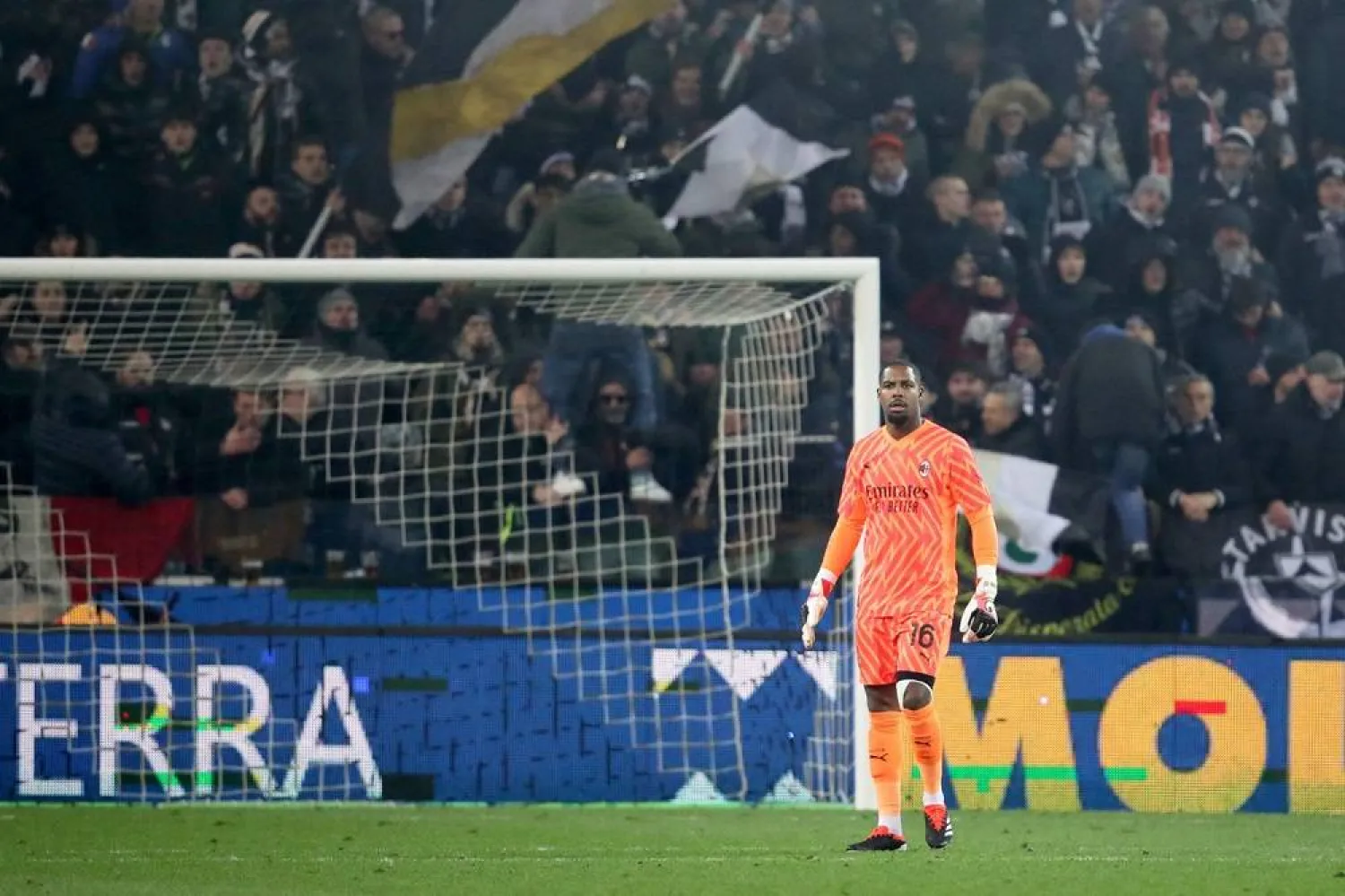 Milan's goalkeeper Mike Maignan reacts during the Italian Serie A football match Udinese Calcio vs AC Milan at the Friuli - Dacia Arena stadium in Udine, on January 20, 2024. (AFP)