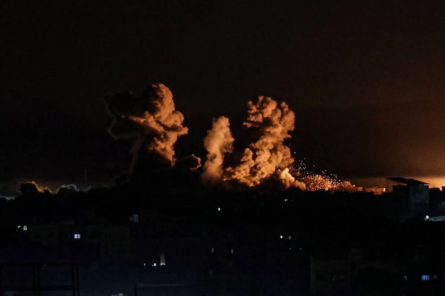 This photograph taken on January 21, 2024 from Rafah, shows smoke billowing during Israeli bombardment over Khan Younis in the southern Gaza Strip, amid ongoing battles between Israel and the Palestinian militant group Hamas. (AFP)
