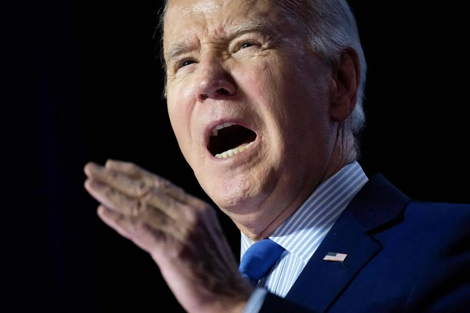 US President Joe Biden speaks during a campaign rally to Restore Roe at Hylton Performing Arts Center in Manassas, Virginia, on January 23, 2024. (AFP)