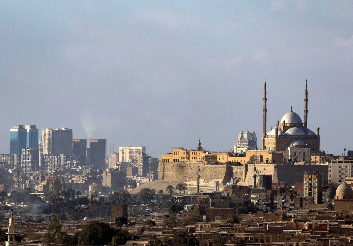 Mohammad Ali Mosque appears on the skyline of the Egyptian capital, from one of the old neighborhoods. (Reuters)

