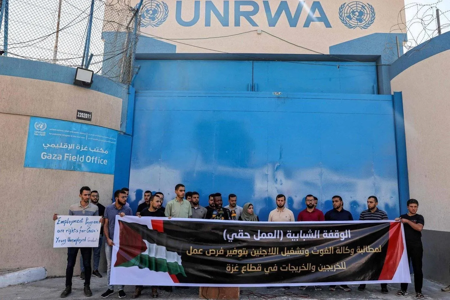 Protesters demanding job opportunities rally in front of the UNRWA headquarters in Gaza City in August. (AFP)
