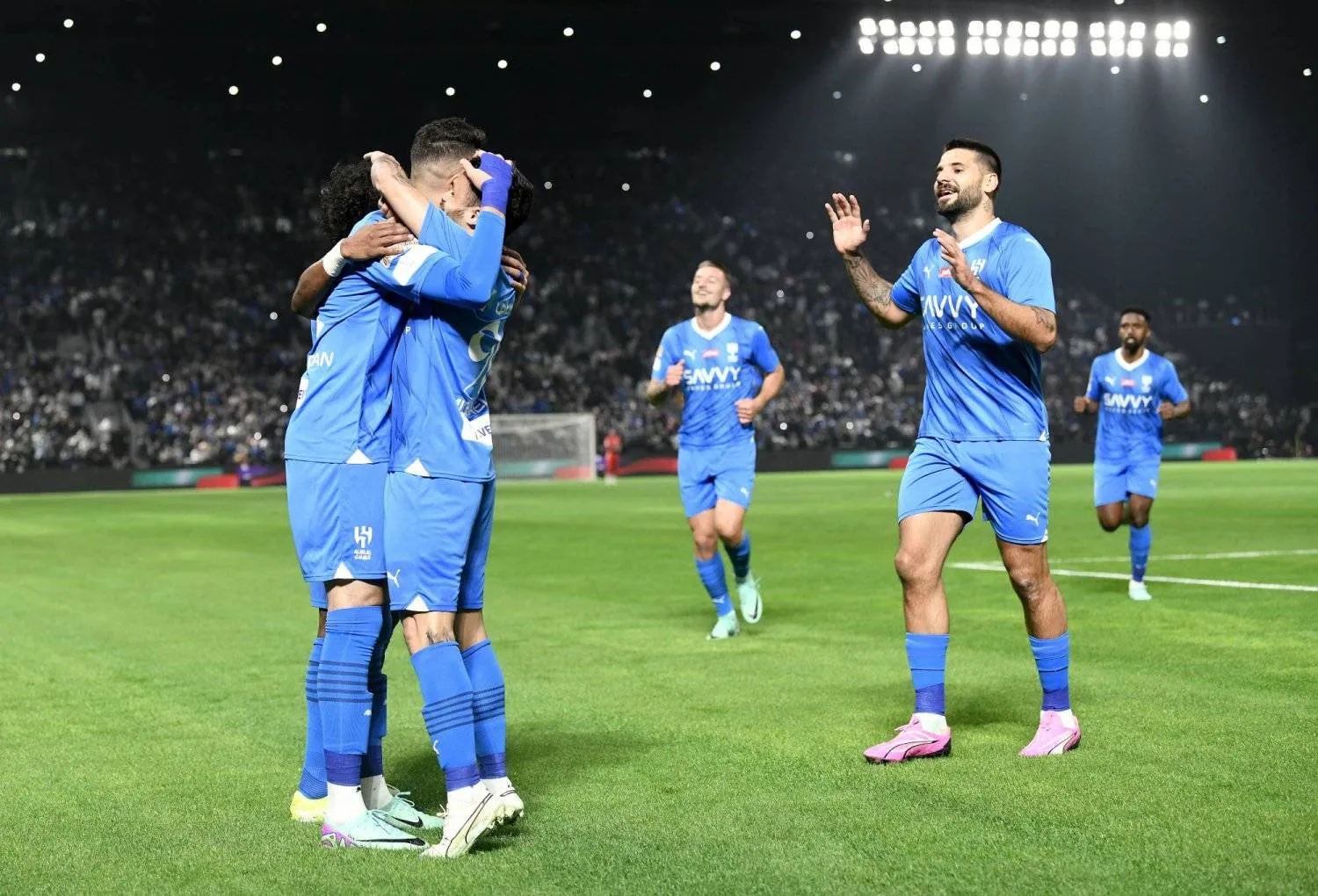 Al-Hilal players celebrate after scoring during the Riyadh Season Cup 2024 match between Al-Hilal and Inter Miami in Riyadh, Saudi Arabia, 29 January 2024. (EPA)