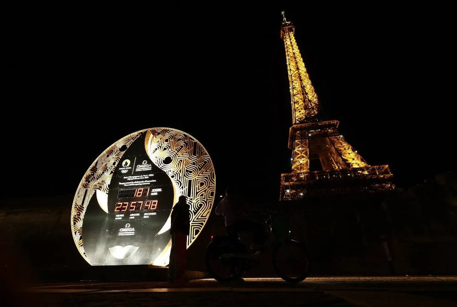 Olympics - Paris six months count down to 2024 Olympics - Paris, France - January 26, 2024 With six months to go until the start of the Paris 2024 Olympics the countdown clock is pictured near the Eiffel Tower. (Reuters)