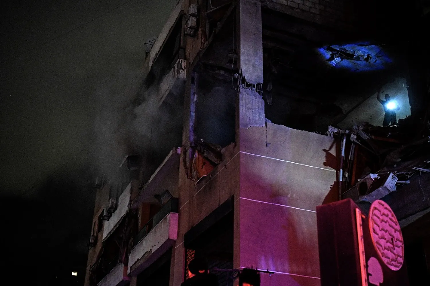 Smoke billows from a destroyed building at the site of an explosion in the southern suburb of Dahiyeh, Beirut, Lebanon, 02 January 2024. (EPA)