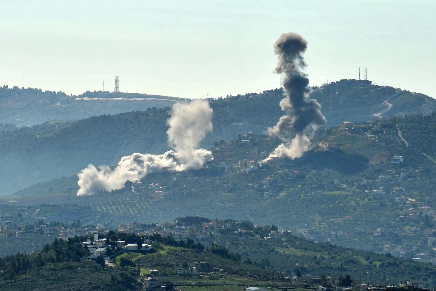 Smoke billows over the southern Lebanese village of Odaisseh near the border with Israel on January 19, 2024, during Israeli bombardment as fighting continues between Israel and the Palestinian group Hamas in Gaza. (Photo by RABIH DAHER / AFP)
