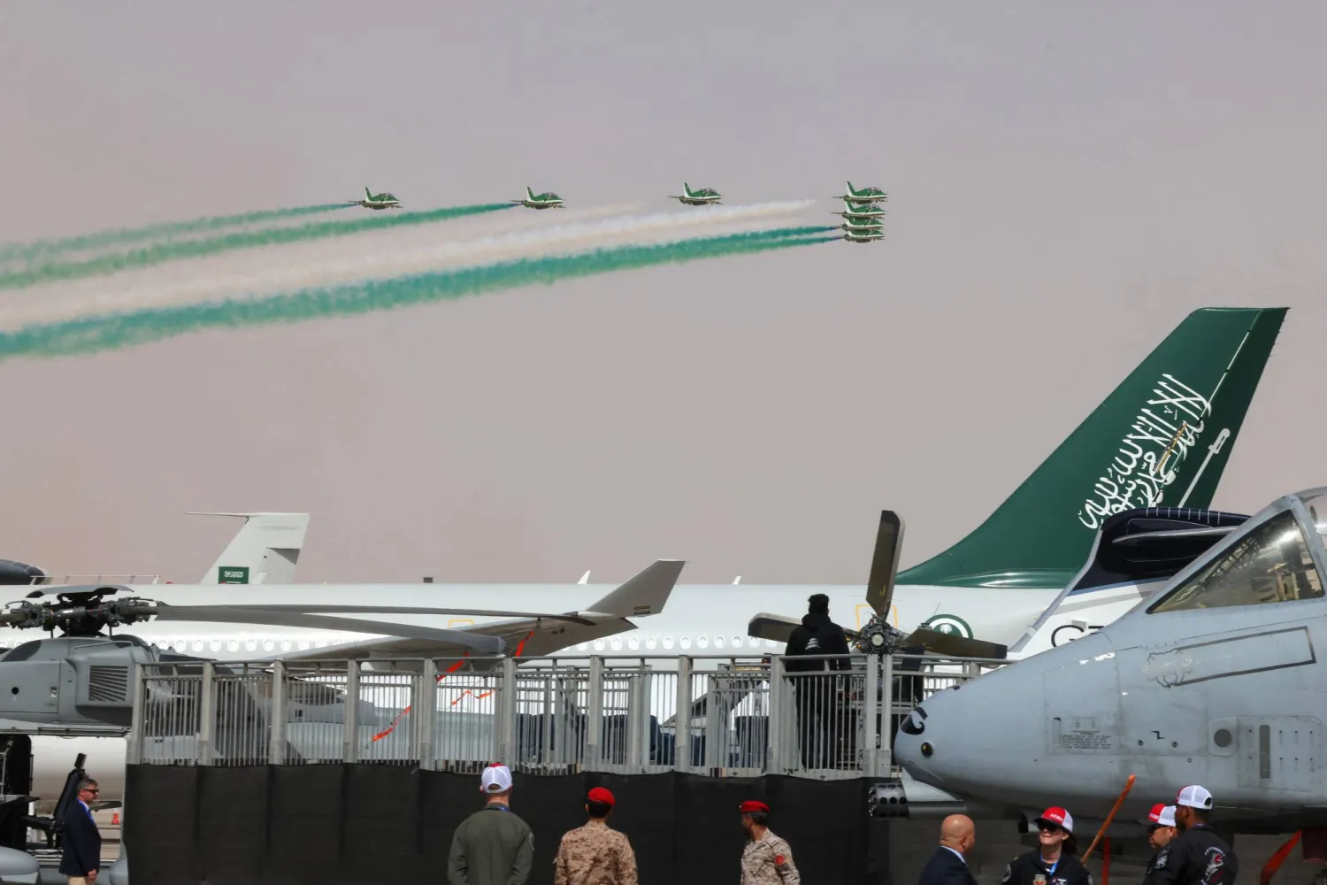 The Saudi Falcons aerobatic flight team performs at the 'World Defense Show 2024', north of the Saudi capital Riyadh on February 4, 2024. (Photo by Fayez Nureldine / AFP)