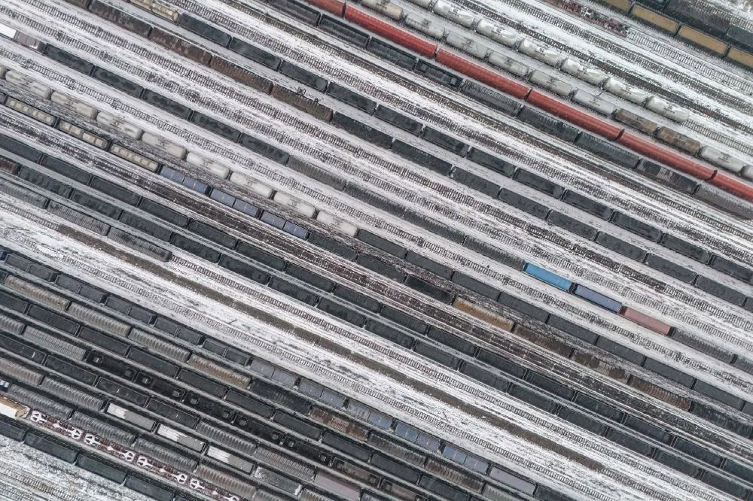 This photo shows an aerial view of the railway marshalling yard of the Zhengzhou North Railway Station amid snowfall in Zhengzhou, in central China's Henan province, on February 4, 2024. (AFP)