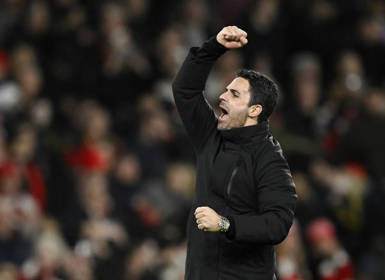 Football - Premier League - Arsenal v Liverpool - Emirates Stadium, London, Britain - February 4, 2024 Arsenal manager Mikel Arteta celebrates after the match. (Reuters)