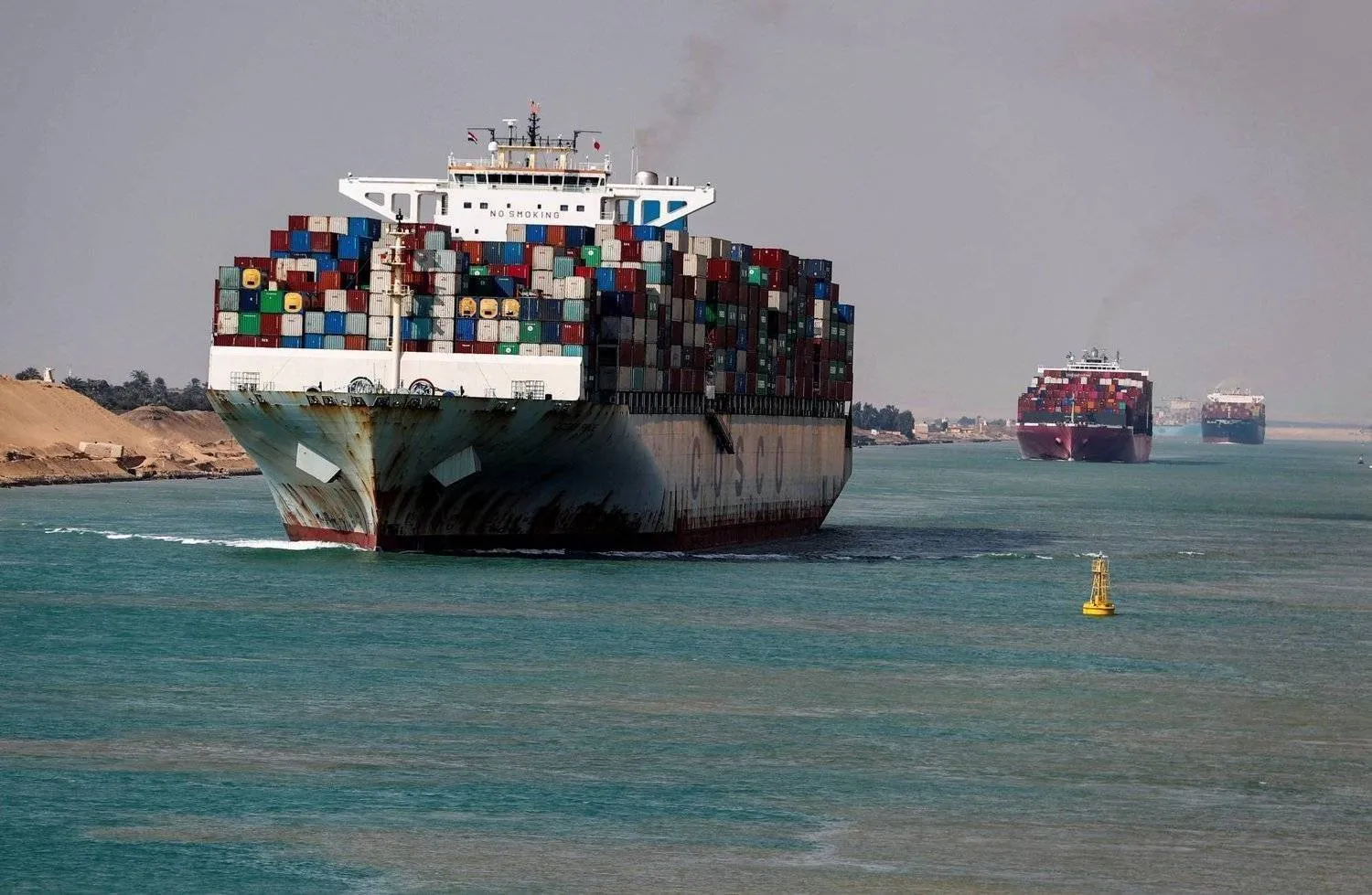 Container ships sail through Egypt’s Suez Canal. (Reuters) 