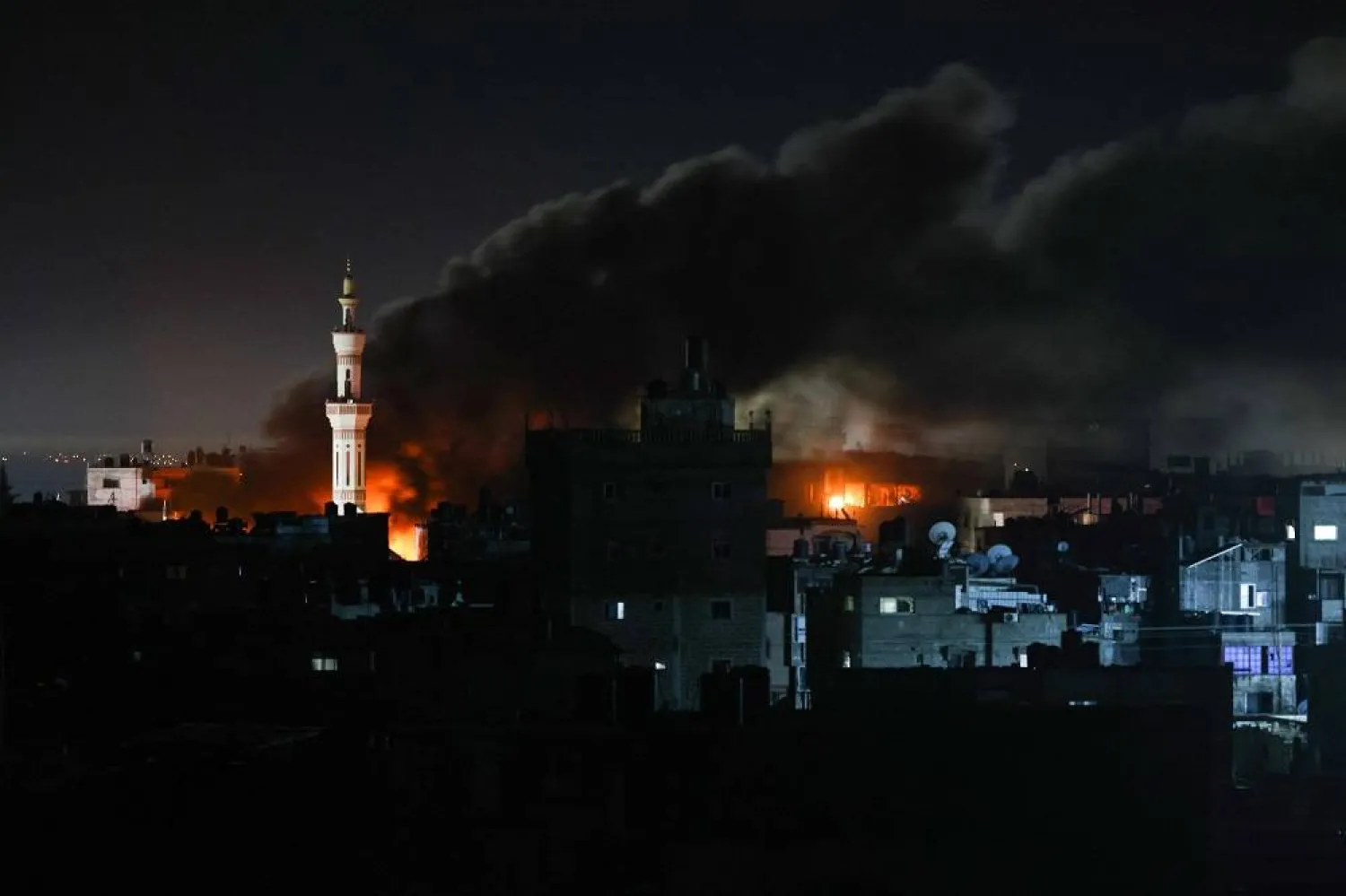 Smoke billows during Israeli bombardment over Rafah in the southern Gaza Strip on February 12, 2024 amid the ongoing conflict between Israel and the Palestinian Hamas militant group. (AFP)